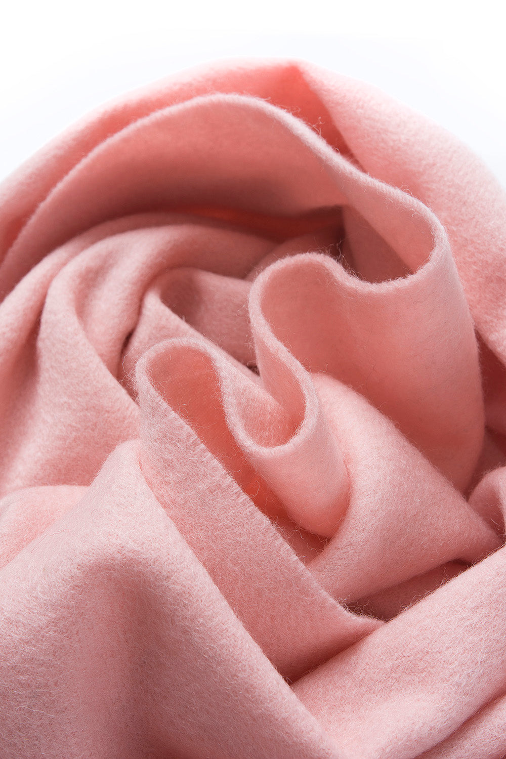 Pink woven lambswool scarf from Start2Finish, plain design, soft and warm, showcasing its plush texture and lightweight fabric.