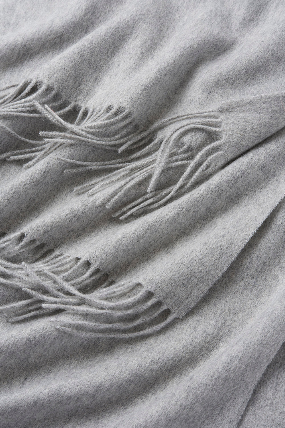 Light grey woven lambswool scarf from Start2Finish, showcasing its soft, plain design and cozy texture for stylish warmth.