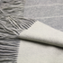 Silver grey wool-white striped cashmere woven double face scarf from Start2Finish, showcasing soft, luxurious fabric and stylish pattern.