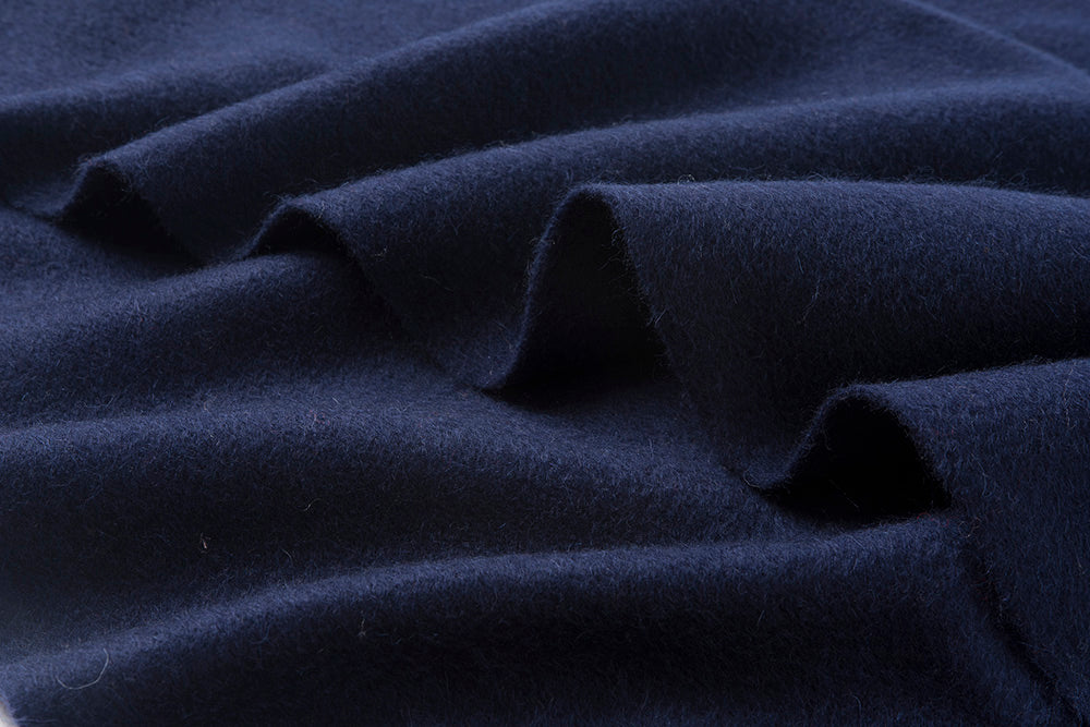Navy lambswool woven scarf from Start2Finish, plain design, soft and warm apparel accessory with fringed ends.