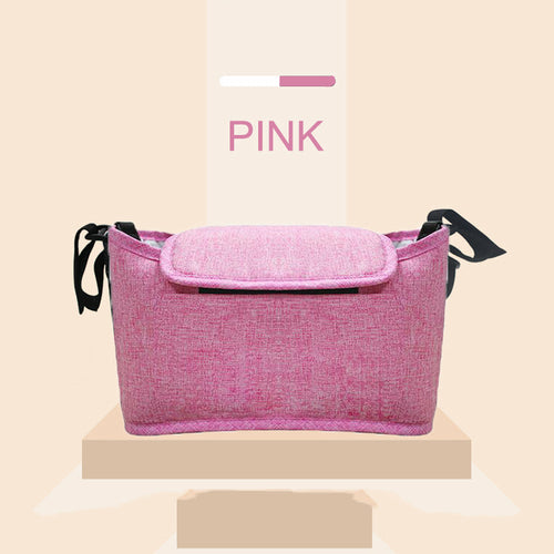 Maroon Asteria stroller bag organizer with multiple compartments attached to a pram for parent and baby accessories.