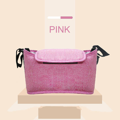 Maroon Asteria stroller bag organizer with multiple compartments attached to a pram for parent and baby accessories.
