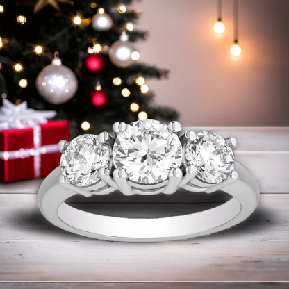 Three stone engagement ring in 14K gold featuring 3 carats of AGI certified lab-grown diamonds with G-VS clarity.