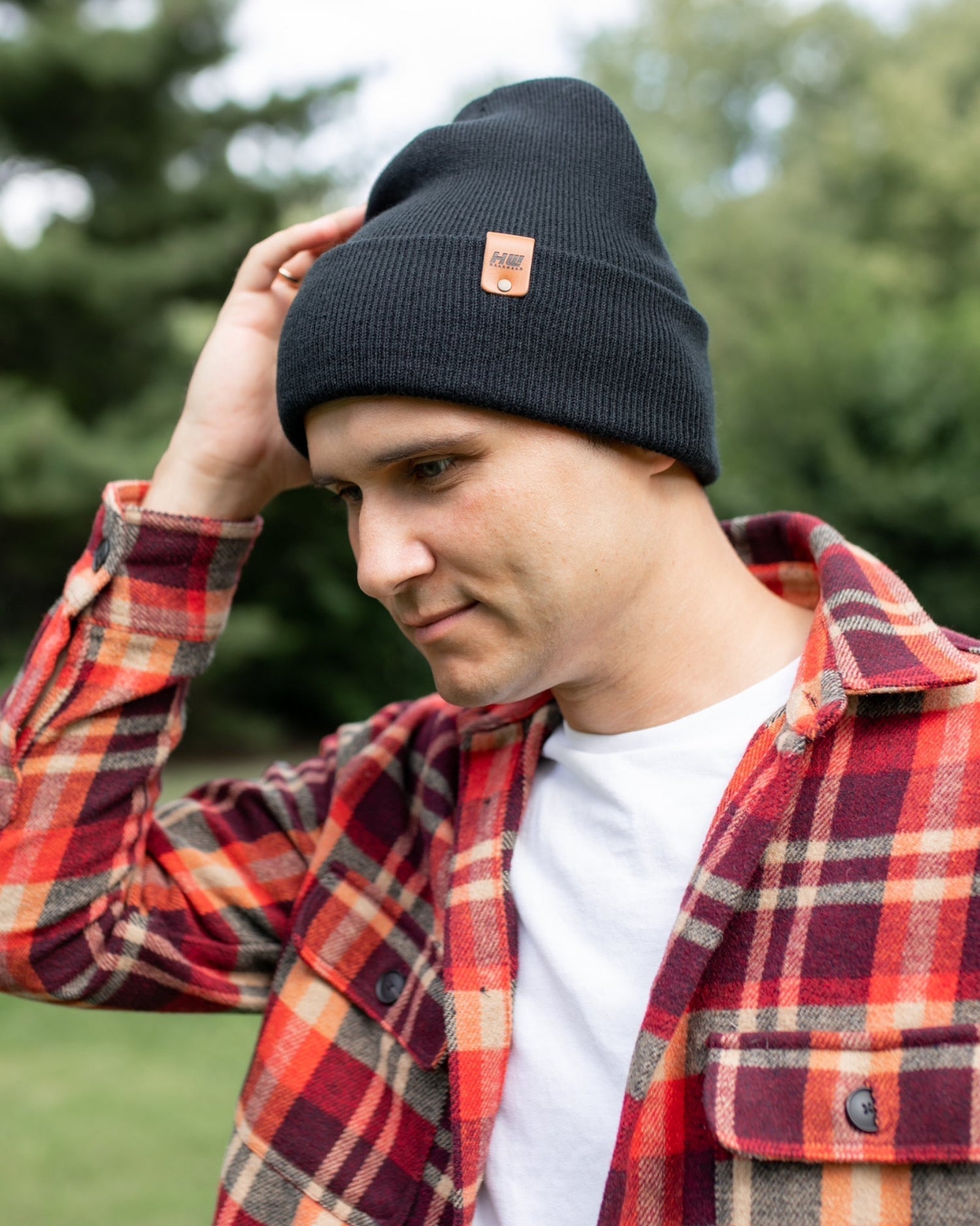 Azure Arrowwood HAAKWEAR knit cuffed beanie in Dune Beige, showing a cozy, ribbed knit hat with cuffed edge and neutral color.
