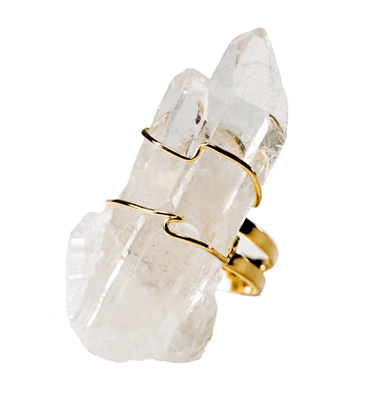 Green Ares quartz ring with a gold band and transparent gemstone, suitable for home decor or jewelry display.
