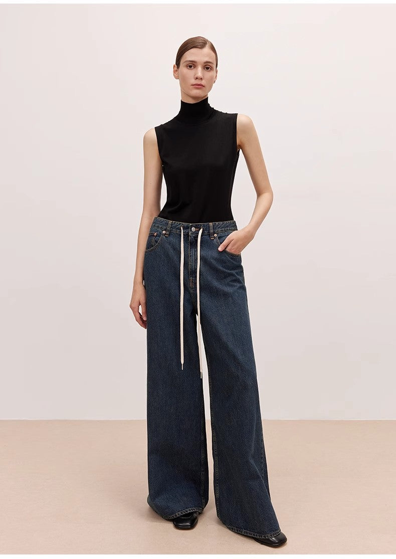 Brown Coeus Retro Blues high waist pleated casual jacket with wide fit, washed denim style, displayed on a hanger.