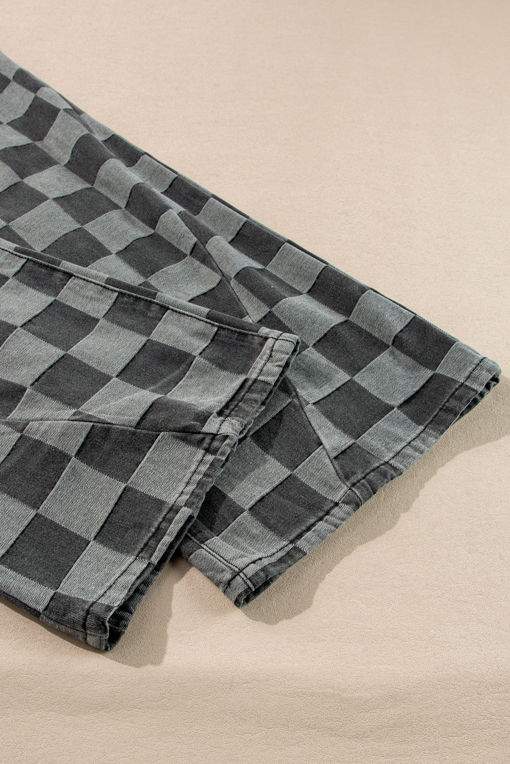 Dark grey checkered denim wide-leg jeans for women by Ruby Styx, featuring a relaxed fit and stylish checkered pattern.