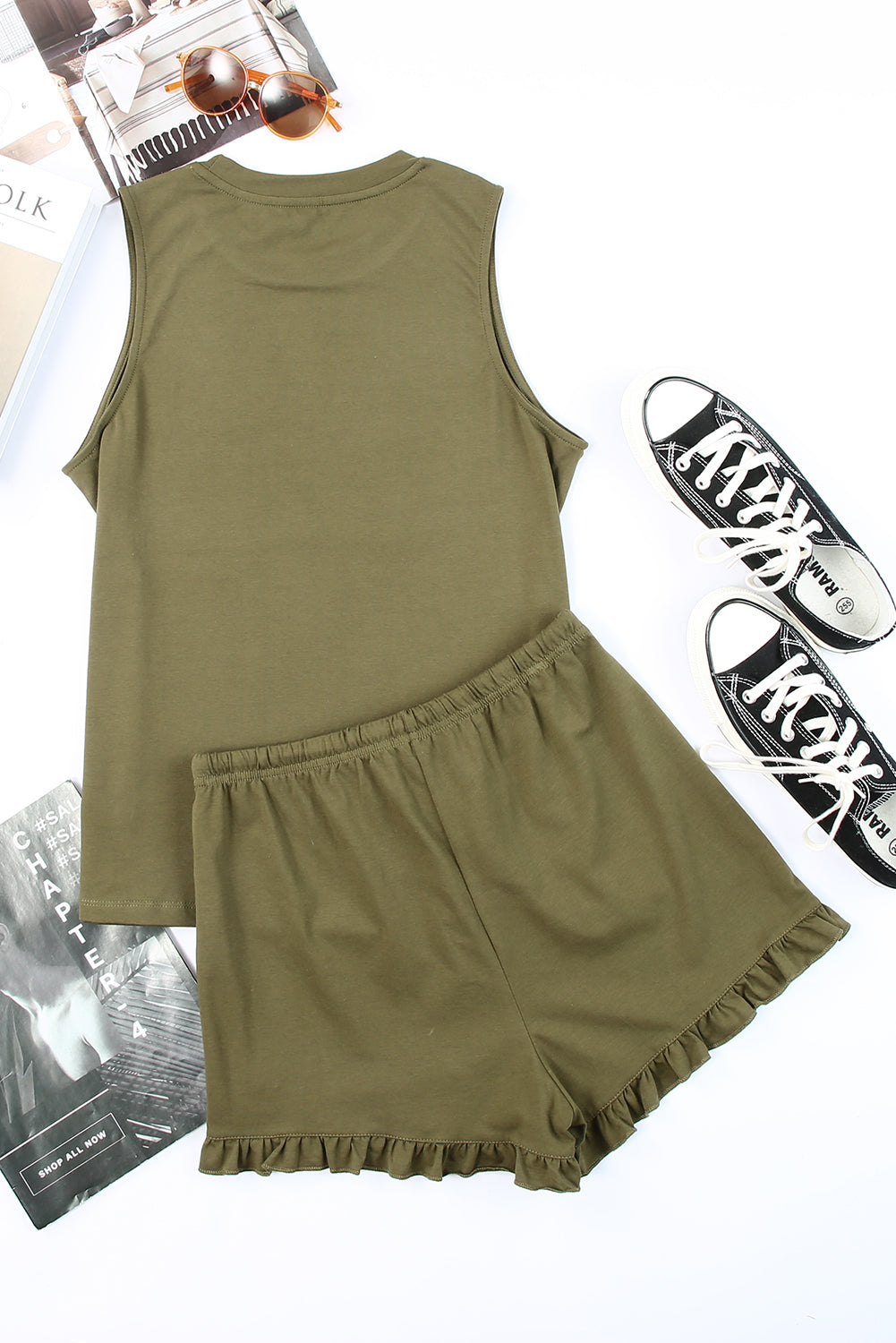Harlequin Daisy green crew neck tank top and ruffled drawstring shorts lounge set, perfect for relaxed bath and beauty days.