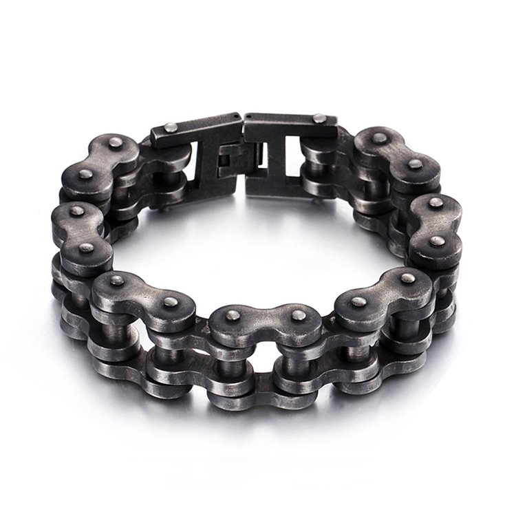 Fuchsia Molly bike chain bracelet with metallic links, stylish unisex jewelry accessory on a neutral background.