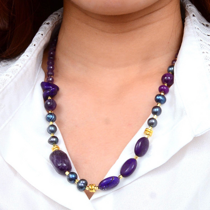 Golden chunky necklace featuring purple amethyst gemstones, crafted by Start2Finish jewelry brand.