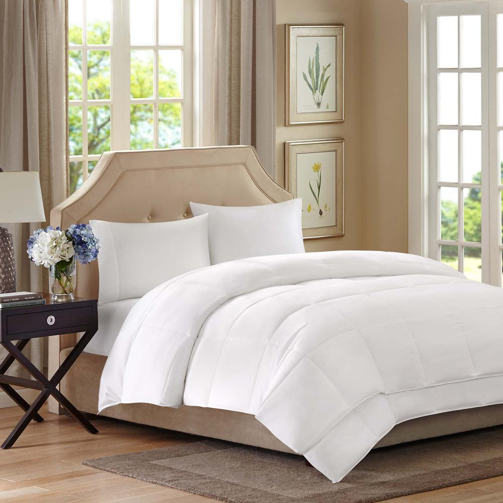 Start2Finish All Season 2-in-1 Down Alternative Comforter on a bed, showing its plush, cozy design suitable for year-round use.