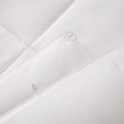 Start2Finish all season 2-in-1 down alternative comforter displayed on a bed, showcasing its cozy, versatile bedding design.