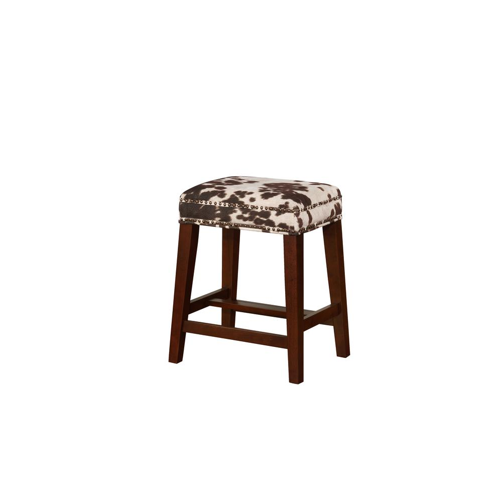 Start2Finish Walt Brown cow print counter stool with a padded seat and metal legs, perfect for kitchen or bar area.