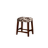 Start2Finish Walt Brown cow print counter stool with a padded seat and metal legs, perfect for kitchen or bar area.