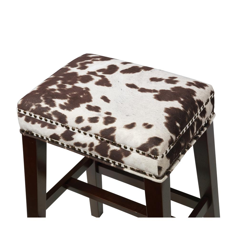 Walt Brown Cow Print Counter Stool by Start2Finish featuring a cushioned seat and metal base with cow print fabric.