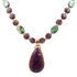 Purple turquoise and gold pendant necklace from Start2Finish jewelry, featuring a striking purple and turquoise design.