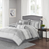 Start2Finish Bennett 7-piece grey comforter bedding set with matching pillow shams and decorative pillows on a bed.
