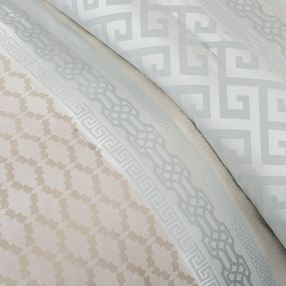 Start2Finish 7-piece comforter set with matching pillow shams and decorative pillows in a cozy, stylish bedroom setting.