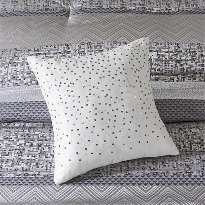 Start2Finish 7-piece jacquard comforter set with intricate woven pattern and matching pillow shams on a neatly made bed.