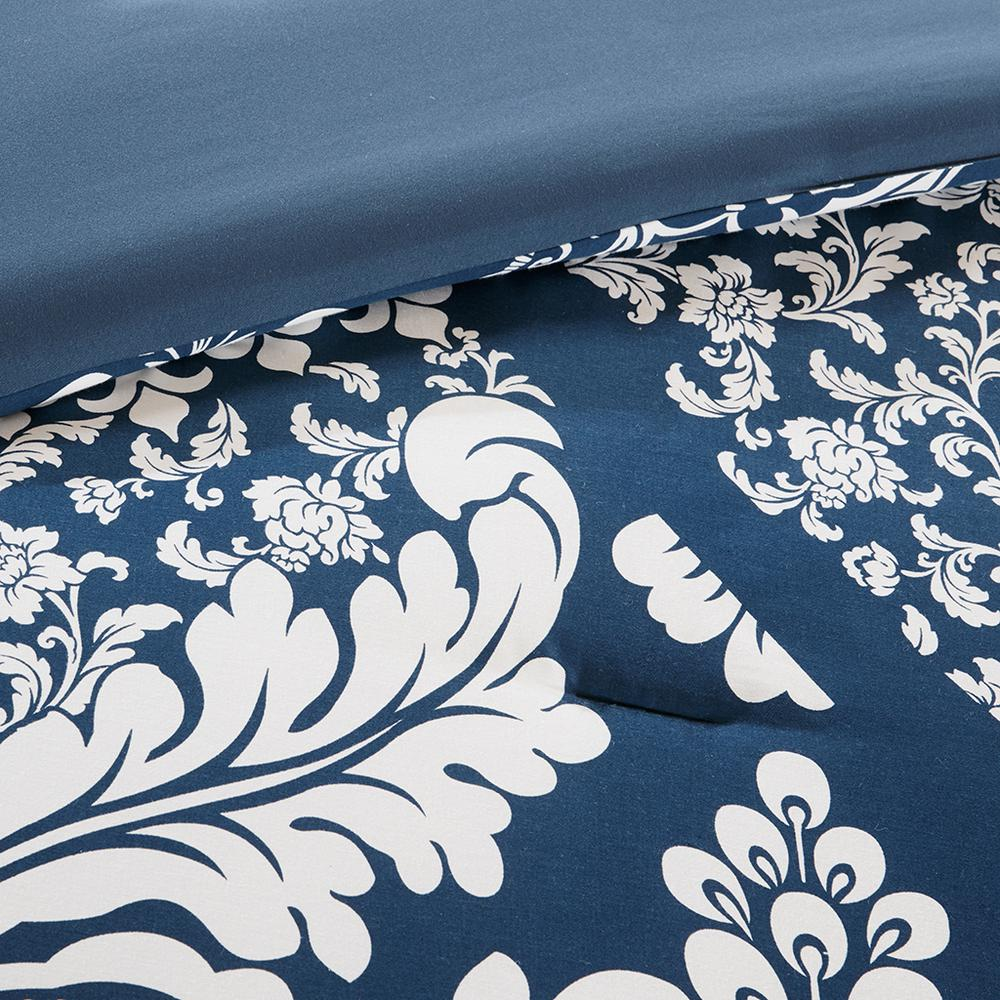 Vienna 7-piece cotton printed comforter set in indigo color showing a floral pattern and matching pillow shams for bedding.