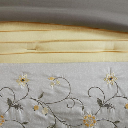 Start2Finish embroidered 7-piece comforter set with floral embroidery, including comforter, pillow shams, and decorative pillows.