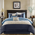 Serene embroidered 7-piece navy bedding comforter set by Start2Finish, featuring detailed embroidery and matching pillow shams.