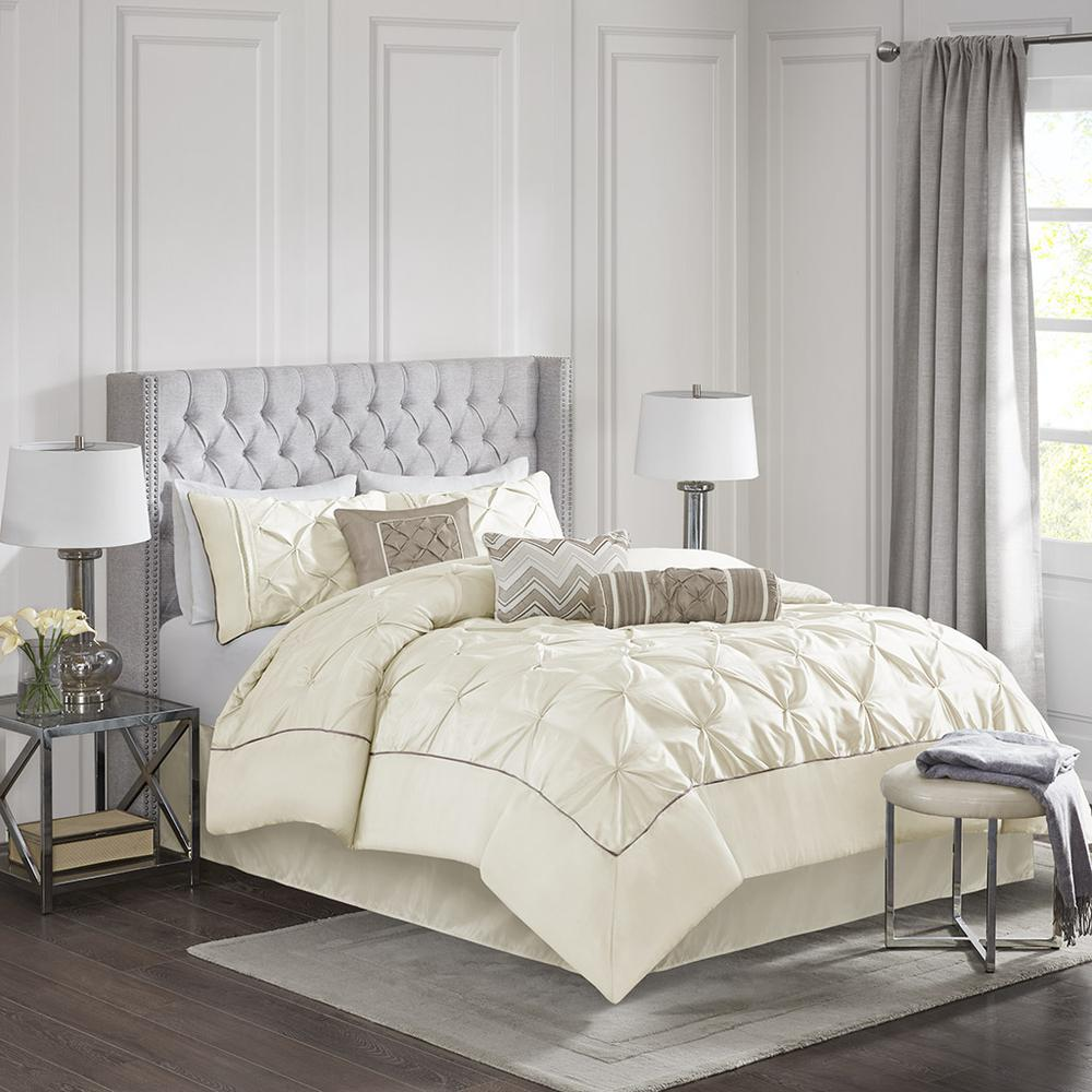 Ivory Laurel 7-piece tufted comforter set by Start2Finish, showcasing a plush, textured bedding ensemble with matching pillow shams.