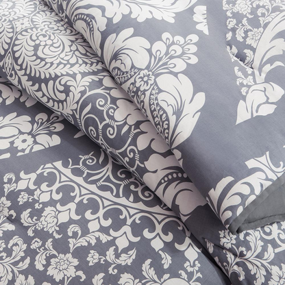 Start2Finish 7-piece cotton printed comforter set featuring colorful floral bedding with matching pillow shams and decorative accents.