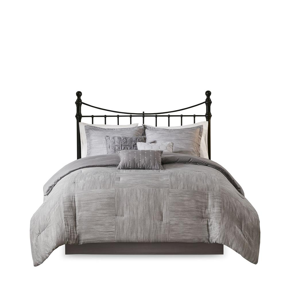 Start2Finish 7-piece printed seersucker comforter set with matching pillow shams and decorative pillows in a vibrant pattern.