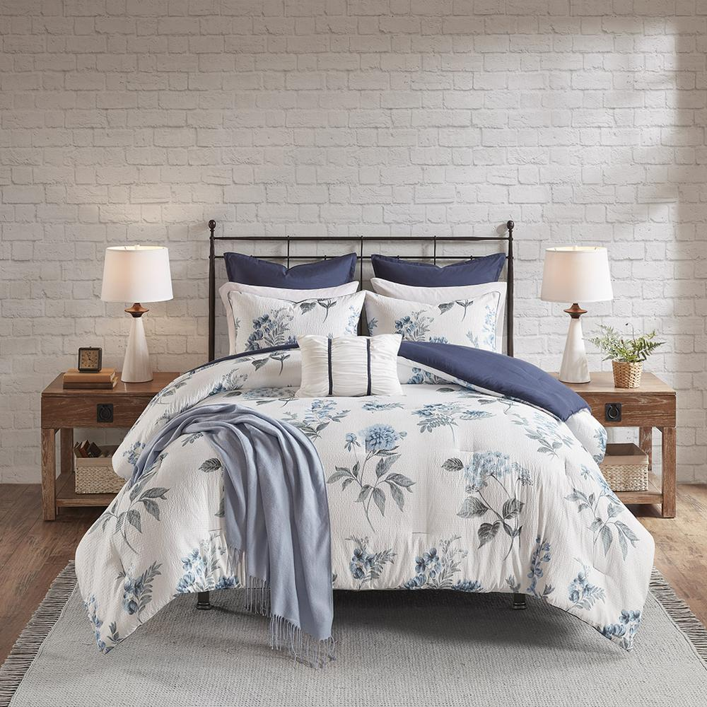 Start2Finish 7-piece printed seersucker bedding set with comforter and matching throw blanket, featuring colorful patterns.