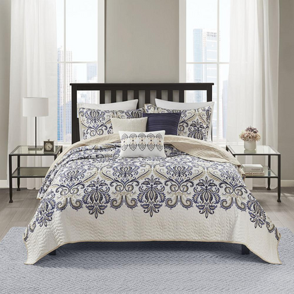 Start2Finish 6-piece reversible quilt bedding set with decorative throw pillows, featuring patterned and solid fabric designs.