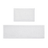 Reversible 100% cotton bath rug with 3000 GSM, featuring a tufted design in neutral tones for plush comfort and style.