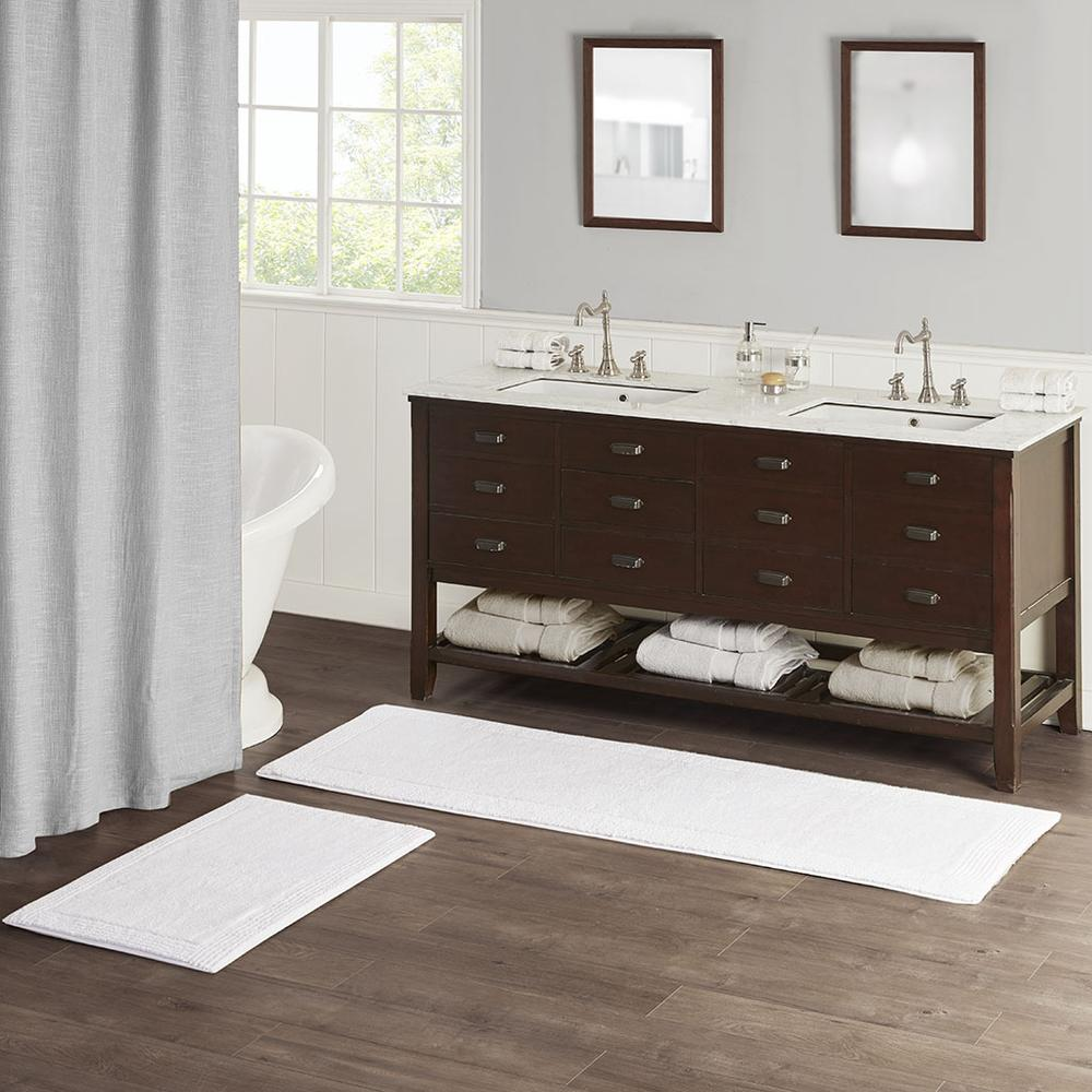 Reversible 100% cotton bath rug with 3000 GSM, plush tufted texture in neutral tones, by Start2Finish.