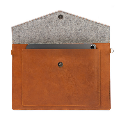 Start2Finish leather MacBook bag with an iPad pocket, stylish accessories case for carrying tech devices securely.