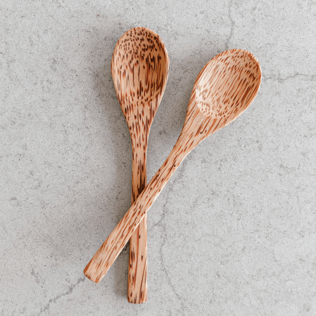 Wooden coconut spoon from Yellow Lavender, natural kitchen utensil for cooking and serving in home and garden settings.