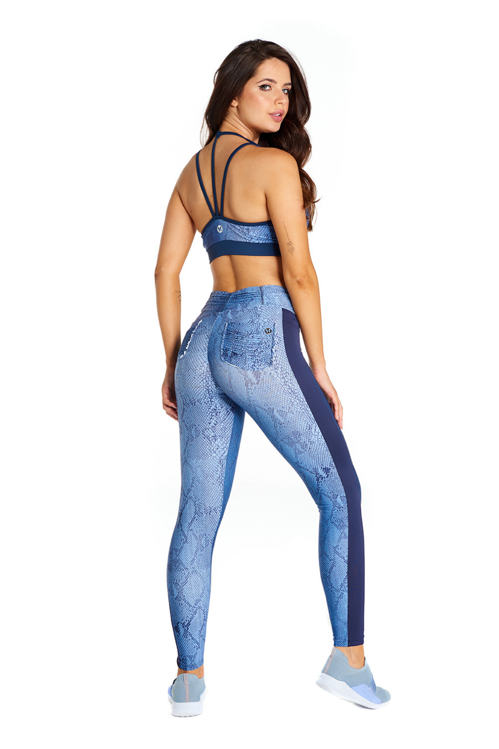 Blue Jungle sports bra from Red Medusa activewear, featuring vibrant jungle print and supportive design for workout comfort.