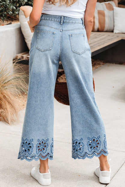 Byzantium Bay solid denim wide-leg jeans with embroidered details, showcasing a relaxed fit and stylish design.
