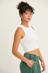 Jade Icarus ribbed knit cropped tank top with fitted design, displayed on a mannequin.