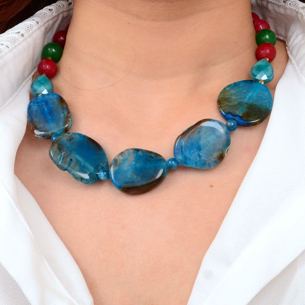 Jeweled blue agate chunky golden necklace with large blue stone beads and intricate gold accents, jewelry by Start2Finish.