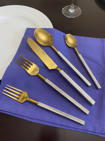 Modern stainless steel flatware set of 20 pieces by Start2Finish, includes forks, knives, spoons arranged on a white background.