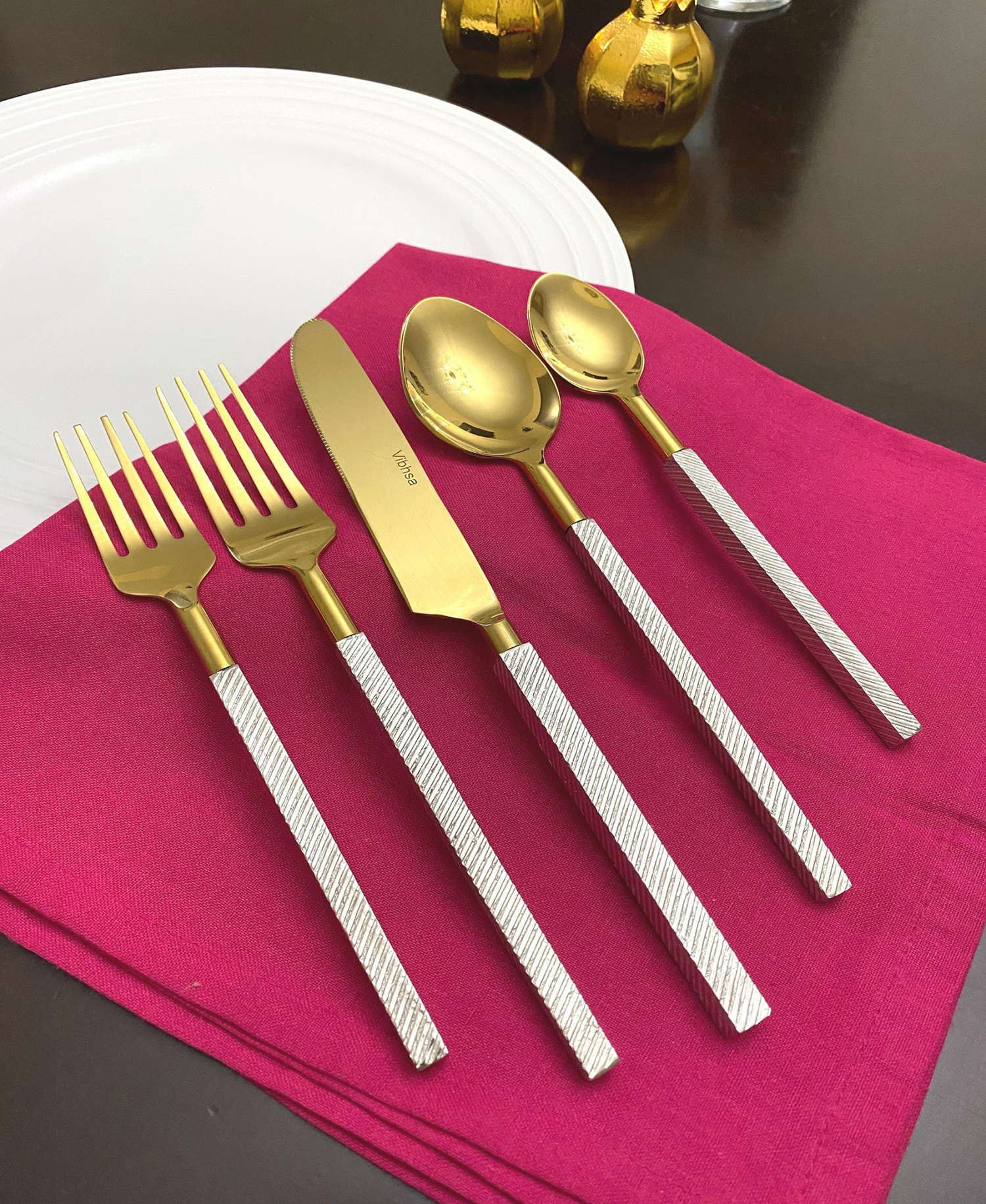 Start2Finish 20-piece modern stainless steel flatware set with forks, knives, spoons on a white background.