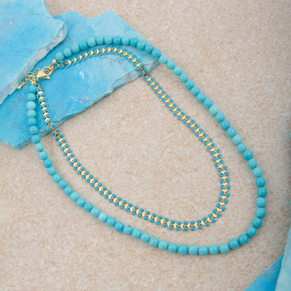 Blue turquoise magnesite layered necklace with gold chevron accents, featuring a stylish jewelry design from Start2Finish.