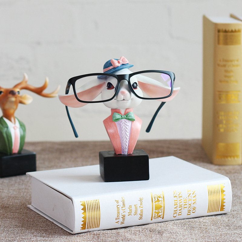 Fuchsia Molly rabbit-shaped eyeglass holder with organization features, designed to keep glasses secure and easily accessible.
