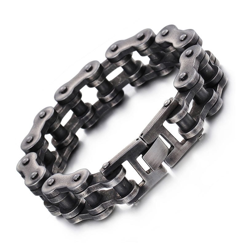 Fuchsia Molly bike chain bracelet with silver-tone links, stylish and adjustable jewelry accessory for casual wear.