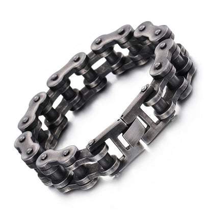 Fuchsia Molly bike chain bracelet with silver-tone links, stylish and adjustable jewelry accessory for casual wear.