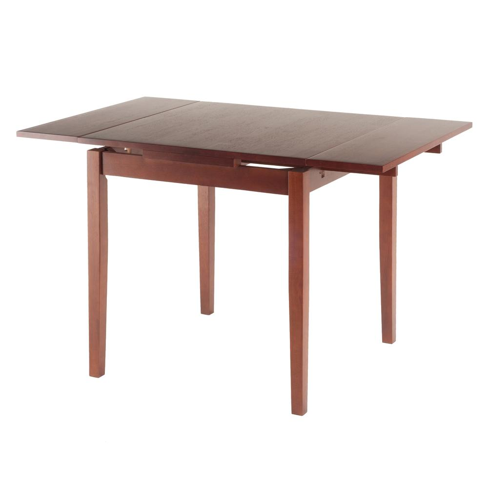 Start2Finish Pulman extension table in walnut wood showing a close-up of the polished surface and extended leaves.
