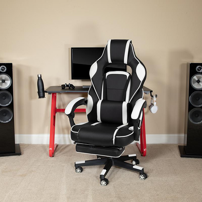 Start2Finish gaming chair with white reclining back and arms, red gaming desk with headphone hook, ergonomic furniture for gamers.