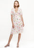 Lemon Hera button front midi skirt in vibrant Fruit Punch color, featuring a flowy design and button details.