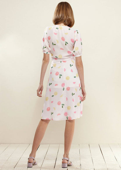 Lemon Hera button front midi skirt in vibrant fruit punch color, featuring a stylish design and midi length.