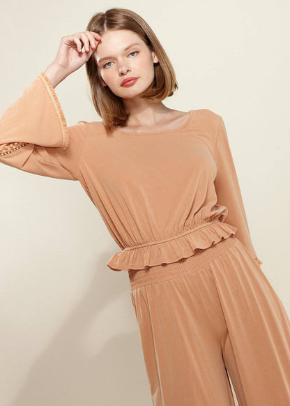 Lemon Hera smocked waist wide leg palazzo pants in apricot fabric, flowing and comfortable with a relaxed fit.